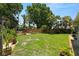 Expansive backyard featuring a well-manicured lawn and lovely landscaping, perfect for outdoor activities at 791 66Th S Ave, St Petersburg, FL 33705