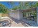 Backyard patio with grill and seating area is great for entertaining at 8108 E 19Th Ave, Tampa, FL 33619