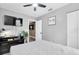 Comfortable bedroom with mounted TV and stylish decor at 8108 E 19Th Ave, Tampa, FL 33619