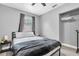 This bedroom features neutral walls, a ceiling fan, and a closet perfect for additional storage space at 8108 E 19Th Ave, Tampa, FL 33619