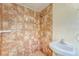 Tile shower has shower head and faucet, as well as soap holder for convenience at 8108 E 19Th Ave, Tampa, FL 33619