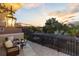 Relaxing outdoor balcony with comfortable seating overlooking a serene view at 8358 Dunham Station Dr, Tampa, FL 33647