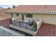 Outdoor balcony with seating and black railings, offering a relaxing outdoor space at 8358 Dunham Station Dr, Tampa, FL 33647