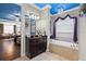 The luxury bathroom has a soaking tub, granite countertop and beautiful decor at 8358 Dunham Station Dr, Tampa, FL 33647
