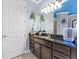 The lovely bathroom features an undermount sink and large granite countertop at 8358 Dunham Station Dr, Tampa, FL 33647