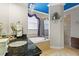 The bathroom has dual sinks, a soaking tub, and a tiled shower at 8358 Dunham Station Dr, Tampa, FL 33647