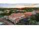 Beautiful two-story home with a screened-in pool and a balcony with sunset views at 8358 Dunham Station Dr, Tampa, FL 33647