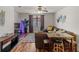 Cozy living room with hardwood floors, comfortable seating, and ample natural light at 8358 Dunham Station Dr, Tampa, FL 33647