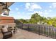 Relaxing covered patio with comfortable seating and beautiful views of the surrounding landscape at 8358 Dunham Station Dr, Tampa, FL 33647