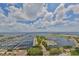 Panoramic aerial view overlooking the marina and bay with sunny, cloud filled skies at 1 Beach Se Dr # 811, St Petersburg, FL 33701