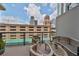 Comfortable balcony seating area with city views and sunny skies at 1 Beach Se Dr # 811, St Petersburg, FL 33701