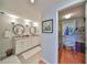 Bright bathroom with double vanity and access to walk-in closet at 1 Beach Se Dr # 811, St Petersburg, FL 33701