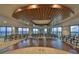 Conference room with seating, hardwood stage, and ocean views, creating a professional and inspiring atmosphere at 1 Beach Se Dr # 811, St Petersburg, FL 33701