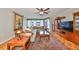 Inviting living room with comfortable seating, decorative rug, and views from expansive windows at 1 Beach Se Dr # 811, St Petersburg, FL 33701
