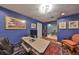 Functional office space with a workspace, and curated artwork for a professional, comfortable home environment at 1 Beach Se Dr # 811, St Petersburg, FL 33701
