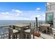 Balcony showcasing outdoor seating and modern art, providing a relaxing space with amazing waterfront views at 100 1St N Ave # 3905, St Petersburg, FL 33701
