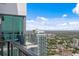 Balcony with a cityscape view, showcasing high-rise buildings and serene green spaces at 100 1St N Ave # 3905, St Petersburg, FL 33701