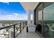 Balcony view overlooking city skyline, showcasing outdoor seating and a modern design at 100 1St N Ave # 3905, St Petersburg, FL 33701