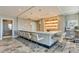 Upscale bar area with modern seating, pendant lighting, and a sleek countertop with beautiful decor at 100 1St N Ave # 3905, St Petersburg, FL 33701
