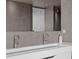 Modern bathroom with a double sink vanity featuring designer fixtures and clean, minimalist lines at 100 1St N Ave # 3905, St Petersburg, FL 33701