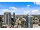 Stunning aerial view capturing downtown buildings in a vibrant cityscape on a clear, sunny day at 100 1St N Ave # 3905, St Petersburg, FL 33701