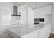 Sleek, modern kitchen with marble countertops, stainless steel appliances, and contemporary design at 100 1St N Ave # 3905, St Petersburg, FL 33701