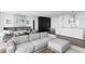 Open-concept living space connecting kitchen, dining, and living areas with elegant decor and fireplace at 100 1St N Ave # 3905, St Petersburg, FL 33701