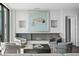 Comfortable living room with a fireplace, stylish decor, and picturesque water views at 100 1St N Ave # 3905, St Petersburg, FL 33701