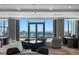 Exclusive lounge area with comfortable seating, expansive windows showcasing beautiful waterfront views at 100 1St N Ave # 3905, St Petersburg, FL 33701