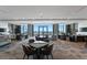 Elegant lounge area offers a modern design with stylish seating, tables, and picturesque water views at 100 1St N Ave # 3905, St Petersburg, FL 33701