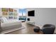 Bright bedroom with city views, modern decor, including a sitting area and mounted television at 100 1St N Ave # 3905, St Petersburg, FL 33701