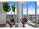 Cozy sitting area with stylish chairs and a picturesque view through expansive windows at 100 1St N Ave # 3905, St Petersburg, FL 33701