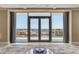 Breathtaking water view seen through large glass doors, adding a luxurious feel to the living space at 100 1St N Ave # 3905, St Petersburg, FL 33701