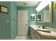 Clean bathroom with white tile floors, and light countertops at 112 Sun Isle Cir # 112, Treasure Island, FL 33706