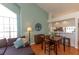 Open floor plan with modern décor and access to dining and kitchen at 112 Sun Isle Cir # 112, Treasure Island, FL 33706
