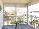Screened patio with a garden view and outdoor seating at 112 Sun Isle Cir # 112, Treasure Island, FL 33706