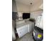 Laundry room with washer, dryer, and water heater at 11423 77Th Ave, Seminole, FL 33772
