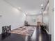 Bonus room with dark wood floors and large window at 11617 Crowned Sparrow Ln, Tampa, FL 33626