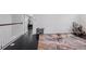 Loft with dark wood floors and views to the bedrooms at 11617 Crowned Sparrow Ln, Tampa, FL 33626