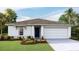 Charming one-story home featuring manicured landscaping and a two-car garage at 1217 Cape Chestnut Pl, Ruskin, FL 33570