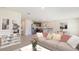 Open-concept living area showcases modern kitchen, dining, and comfortable seating at 1217 Cape Chestnut Pl, Ruskin, FL 33570