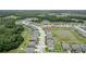 Gorgeous aerial view of the neighborhood with ponds and green spaces in a well-maintained community at 12189 Nouveau Ave, Spring Hill, FL 34610