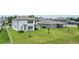 Aerial view showcasing backyard, neighborhood, landscaping at 12189 Nouveau Ave, Spring Hill, FL 34610