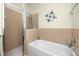 Bathroom featuring a shower, bath, and decorative ship's wheel at 12337 Rose Haven Blvd, New Port Richey, FL 34654