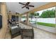 Outdoor patio with screened lanai and seating area for relaxing and enjoying the weather at 12337 Rose Haven Blvd, New Port Richey, FL 34654