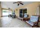 Outdoor patio with screened lanai and seating area for relaxing and enjoying the weather at 12337 Rose Haven Blvd, New Port Richey, FL 34654
