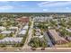 An aerial view of the neighborhood and surrounding area, showcasing the tree lined street at 1269 Drew St, Clearwater, FL 33755