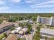 The building's location is highlighted with an aerial view, showcasing proximity to services and residential areas at 1269 Drew St, Clearwater, FL 33755