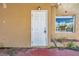 A rear entrance features a solid door and window, offering both security and natural light at 1269 Drew St, Clearwater, FL 33755