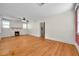 Inviting living room with a decorative fireplace, hardwood floors, and natural light at 1269 Drew St, Clearwater, FL 33755